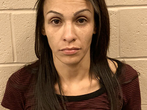 Woman charged with shooting son