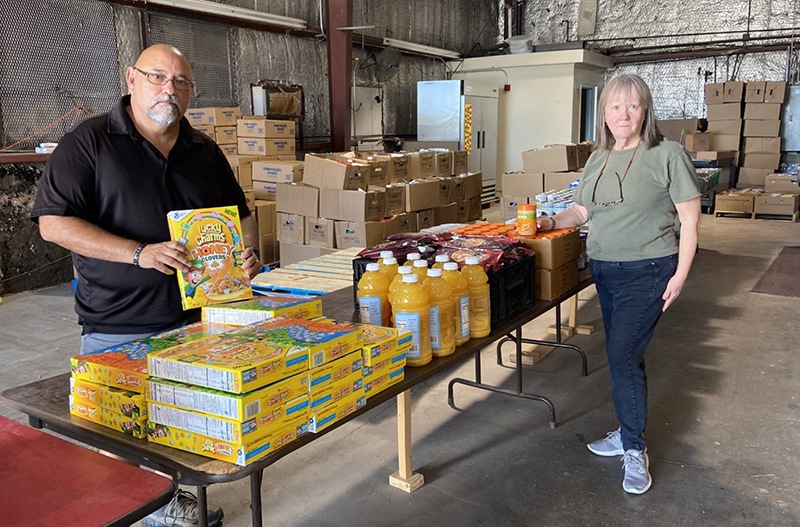 Belen Area Food Pantry President Joe Portio, left, and volunteer Robin Holbrook, say they are able to feed more than 4,000 people a month from the current location — a location they have to vacate by the end of July.