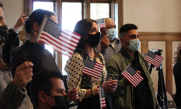 ACHIEVING THE DREAM: 20 pledge their allegiance to U.S. while becoming citizens