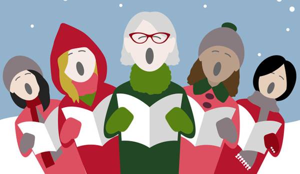 group of female singers singing Christmas carols in the snow