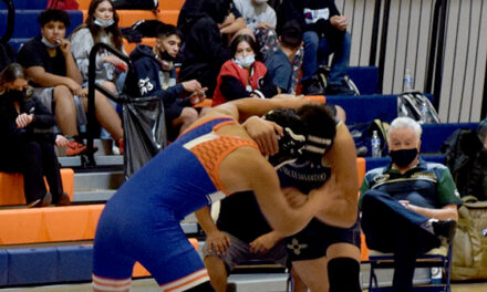 Local wrestlers and ballers continue regular season
