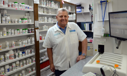 Local pharmacist honored for his outstanding service